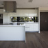 Interior of top floor penthouse overlooking gardens