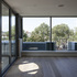 Interior of top floor penthouse overlooking gardens 
