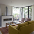 Spacious living area overlooking garden and trees