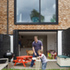 Timber shingles clad the rear elevation