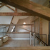 Mezzanine: the original oak floorboards and deal roof structure were retained
