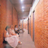 Dressers await the second half in the back stage corridor
