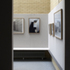 The gallery space is quiet and reserved, letting the exhibited work stand out