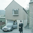 Large windows are set into the lrach cladding that covers the gable end
