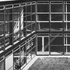 Fully glazed walls of one interior courtyard