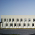 The exterior treatment is render and expressed expansion joints
