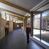 A cork-clad sensory wall helps children to orient themselves around the school