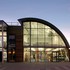 The public face of the building; the glazed facade shows the library below and community rooms above