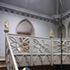 Main staircse with reinstated carved antelope newels