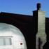 Constrast between matt black rubber and the shiny aluminium Airstream Caravan
