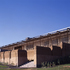The building slots into the sloping site