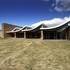 Scalloped roofs provide shade and shelter for terraces