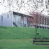 The entrance pavilion is attached to the building by Spence