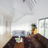 Hoo House, photograph of living area and stairs