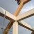 During contruction; the relationship between the concrete core and the timber structure that supports the external envelope