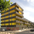 Yellow pre-cast concrete panelling