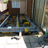 Helical pile foundation system
