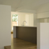 View from living area to raised kitchen with terrace