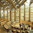 The central debating chamber, finished in oak, sycamore and glass
