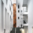Visitors can access the ground and third storeys by the central stairwell and lift core. Additional stairwells serve the book storage stacks used by library employees