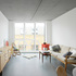 Flats have exposed precast concrete ceilings and  blockwork walls finished with plaster
