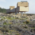 Two telescopes are mounted on concrete pillars independent of the main structure
