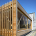 The western red cedar louvres act as a symbol of the works behind