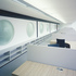 The first floor showing large porthole windows