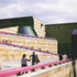 The colourful elements, such as the fat tube parapet handrails, counteract the possible appearance of a monumental stone quarry