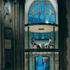 New glass entrance doors to the west end are framed as a glass cylinder, with space above used as an office space