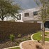 Ironstones in galvanised steel cages line the property