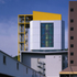 West end of factory with temporary cladding at lower level