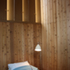 The Bedroom is lined with cedar wall panels